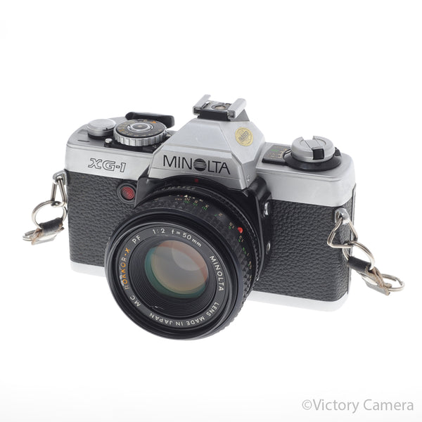Minolta XG-1 XG1 Chrome 35mm Camera w/ 50mm f2 Prime Lens [EXC]