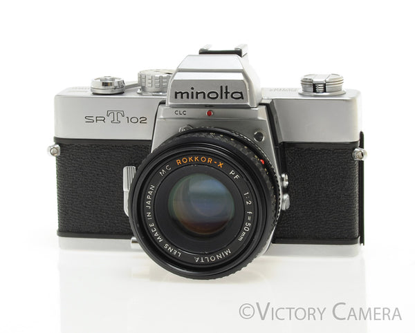 Minolta SRT 102 Chrome 35mm Camera w/ 50mm f2 Lens -New Seals- [EXC]