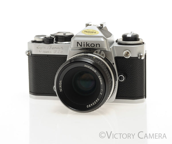 Nikon FE Chrome 35mm Film SLR Camera 50mm f2 Lens -New Seals