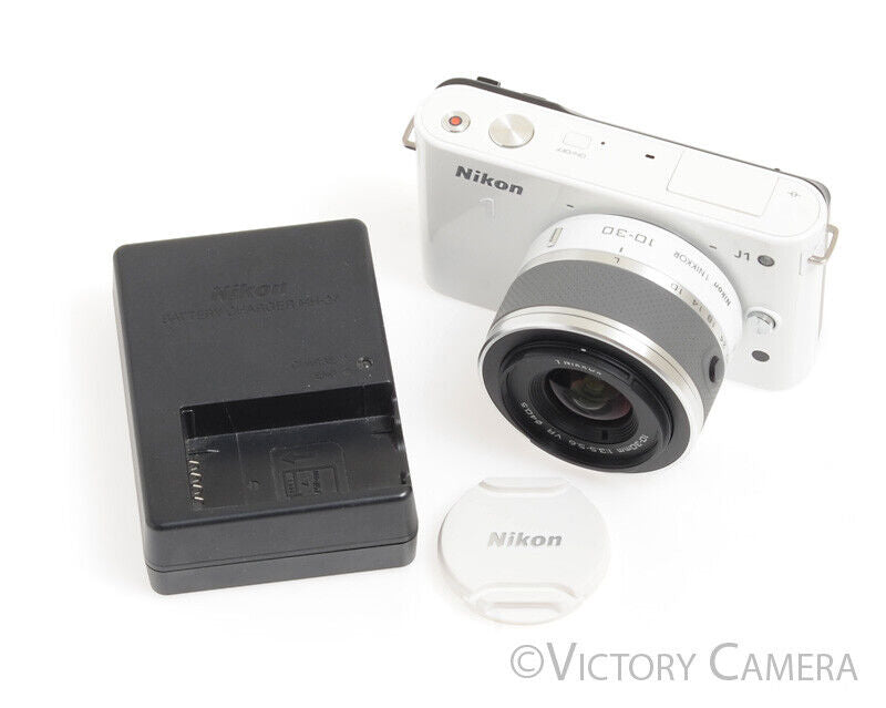 white nikon camera