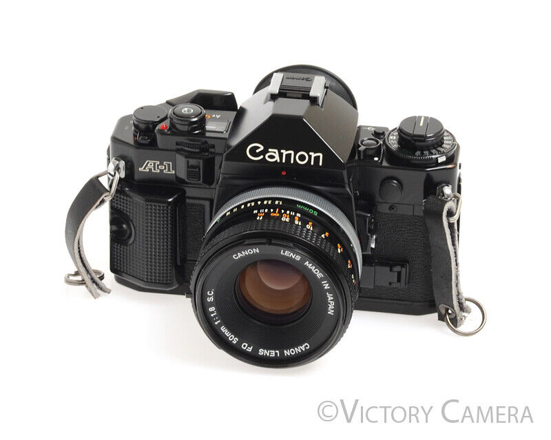 Canon A-1 Black 35mm Camera w/ 50mm F1.8 Lens &amp; Grip -New Seals, No Squeak- - Victory Camera