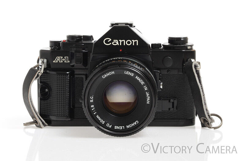Canon A-1 Black 35mm Camera w/ 50mm F1.8 Lens &amp; Grip -New Seals, No Squeak- - Victory Camera