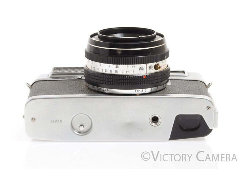 Minolta Uniomat II Chrome 35mm Rangefinder Camera w/ 45mm F2.8 Lens