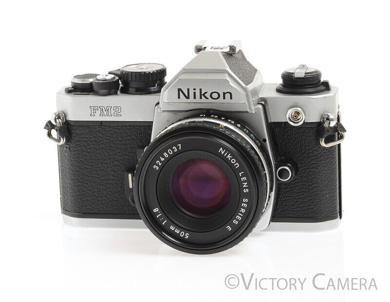 Nikon FM2 Chrome 35mm Film SLR w/ Nikon Series E 50mm f1.8 Lens -New Seals-