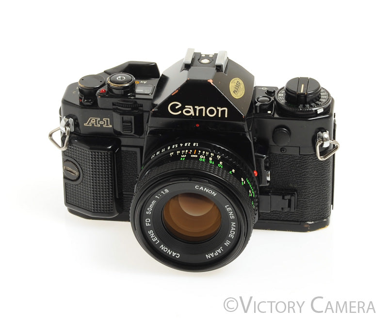 Canon A-1 A1 Black 35mm Film SLR Camera w/ 50mm F1.8 Lens -New Seals-
