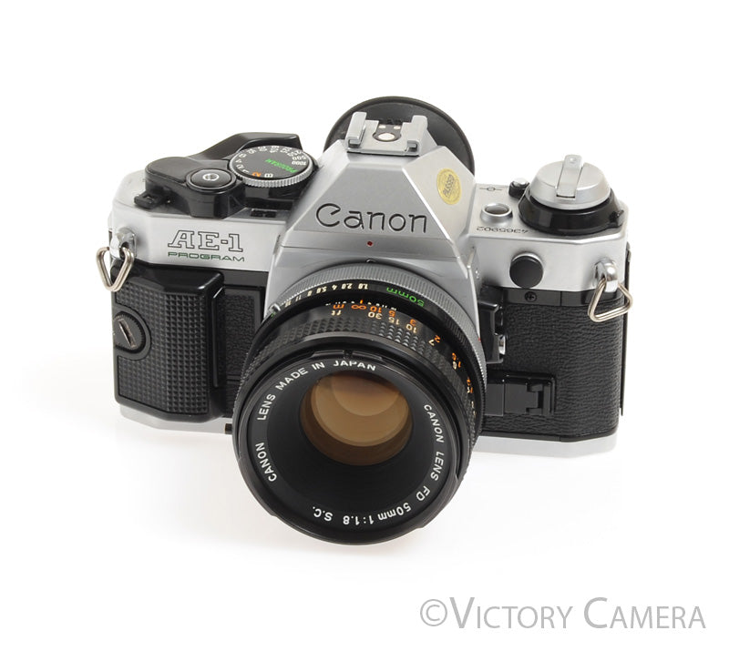 Canon AE-1 Program Chrome 35mm Film SLR Camera 50mm F1.8 Lens -New Sea