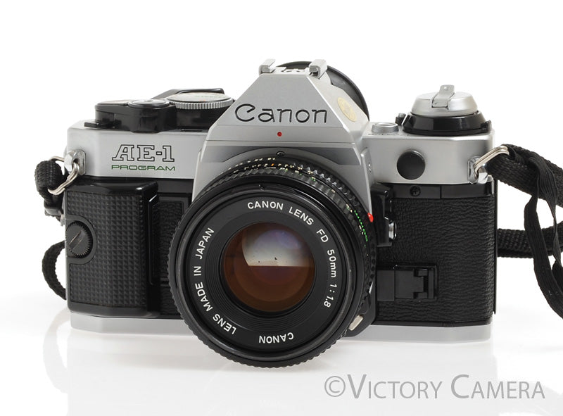 Canon AE-1 Program Chrome 35mm Film SLR Camera w/ 50mm F1.8 Lens -New Seals- - Victory Camera
