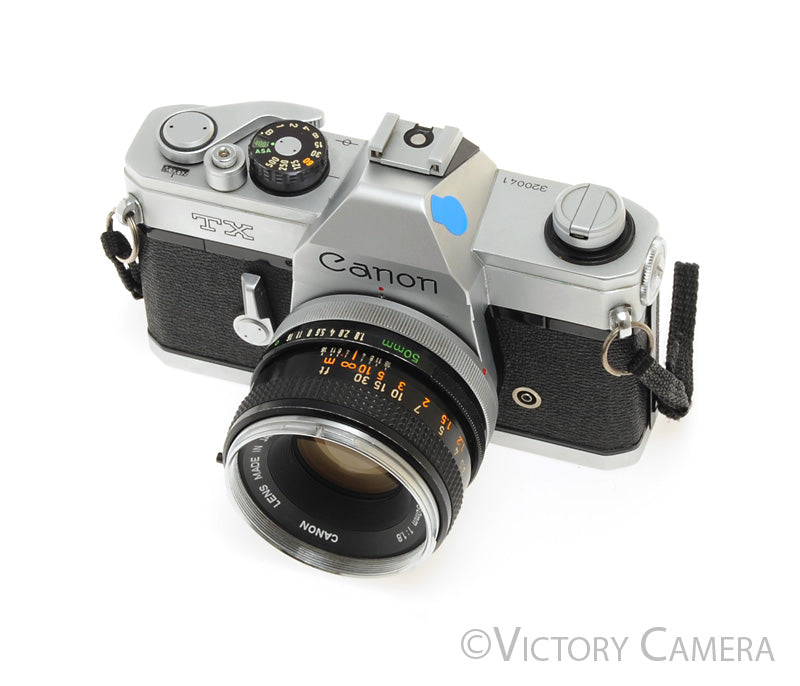 Canon TX Chrome 35mm SLR Camera w/ 50mm f1.8 Lens -New Seals- [EXC] - Victory Camera