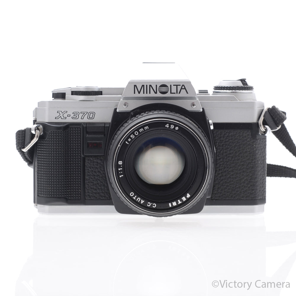 Minolta X-370 Chrome 35mm Manual Focus Camera w/ Petri 50mm f1.8 Lens [EXC+] image 1