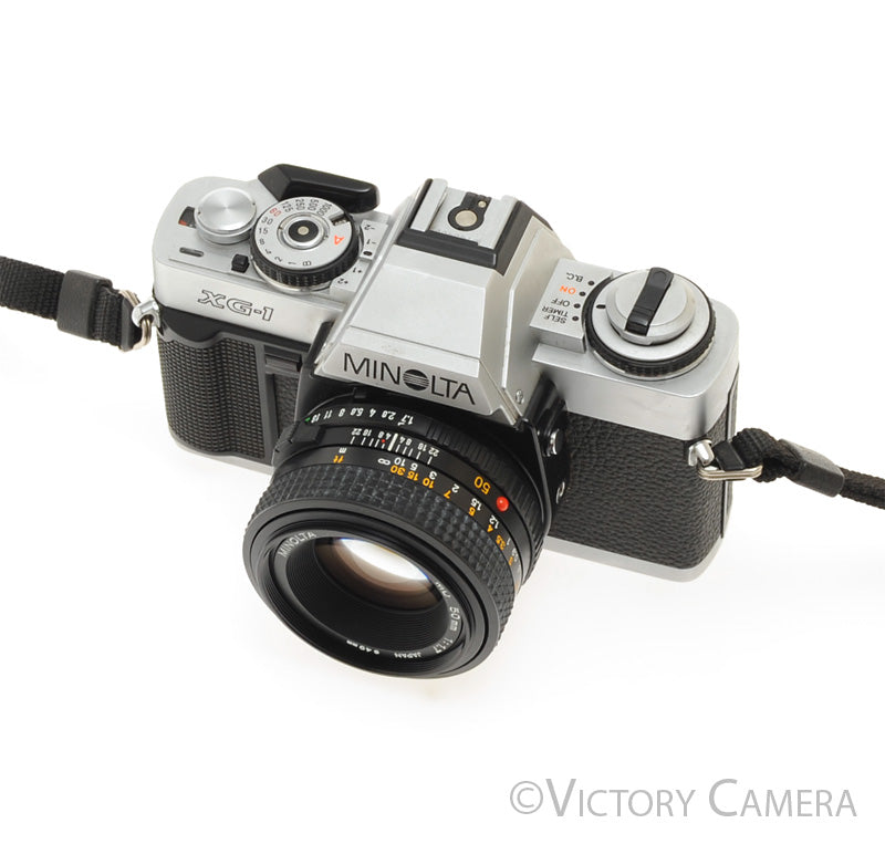 Minolta XG1 Chrome 35mm Camera w/ MD 50mm f1.7 Lens -Good Seals- [EXC+]