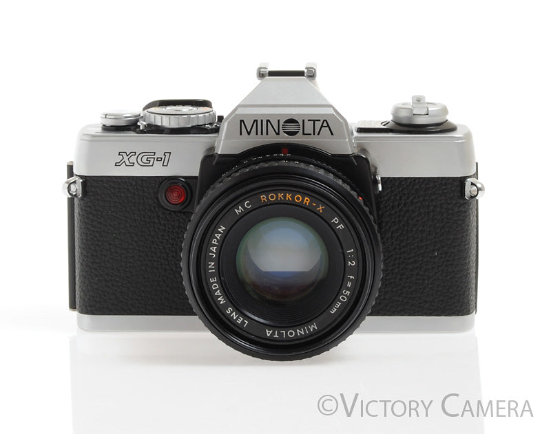 Minolta XG-1 XG1 Chrome 35mm Camera w/ Rokkor 50mm f2 Lens -New Seals- - Victory Camera