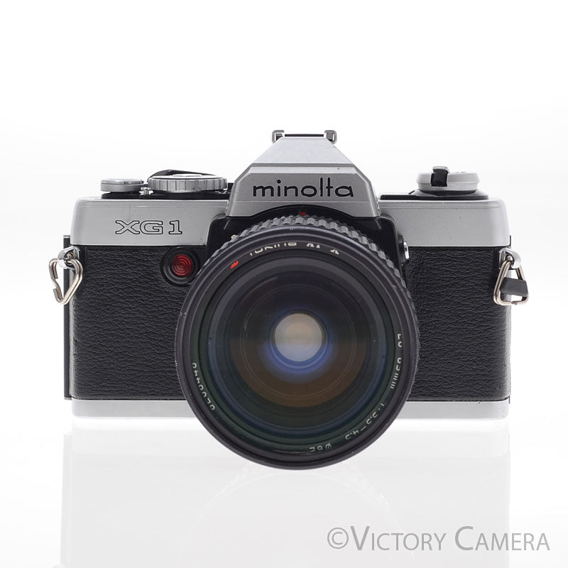 Minolta XG1 Chrome 35mm Camera w/ MD 28-85mm f3.5-4.5 Lens [EXC-]