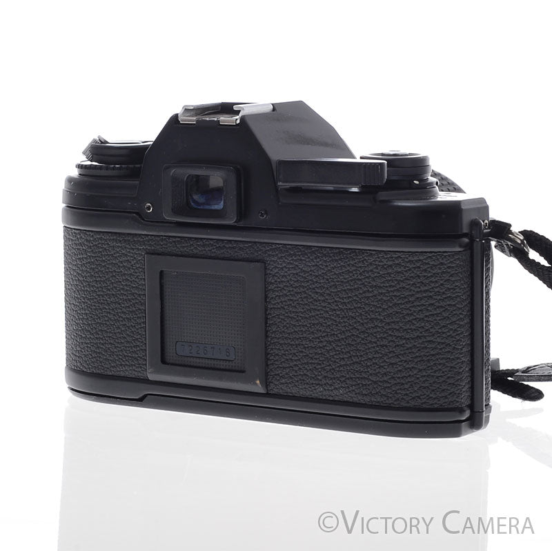 Nikon EM Black 35mm Film Camera with 35-70mm Zoom Lens [EXC-]