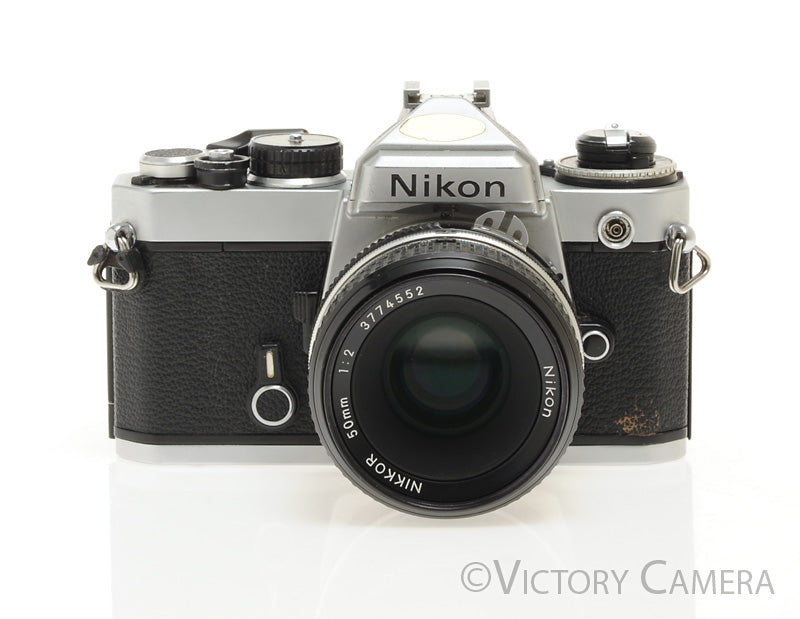 Nikon FE Chrome 35mm Film SLR Camera 50mm f2 Lens -New Seals- [EXC-] - Victory Camera