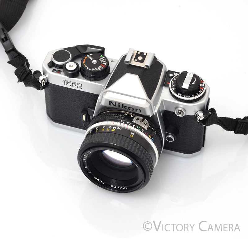 Nikon FE-2 FE2 Chrome 35mm Camera with 50mm f1.8 AI Lens -New Seals- [EXC+]