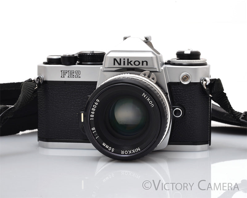 Nikon FE-2 FE2 Chrome 35mm Camera with 50mm f1.8 AI Lens -New Seals- [EXC+]