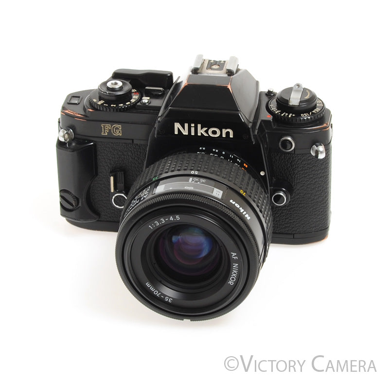 Nikon FG Black 35mm Film Camera w/ 35-70mm Zoom Lens -New Seals-