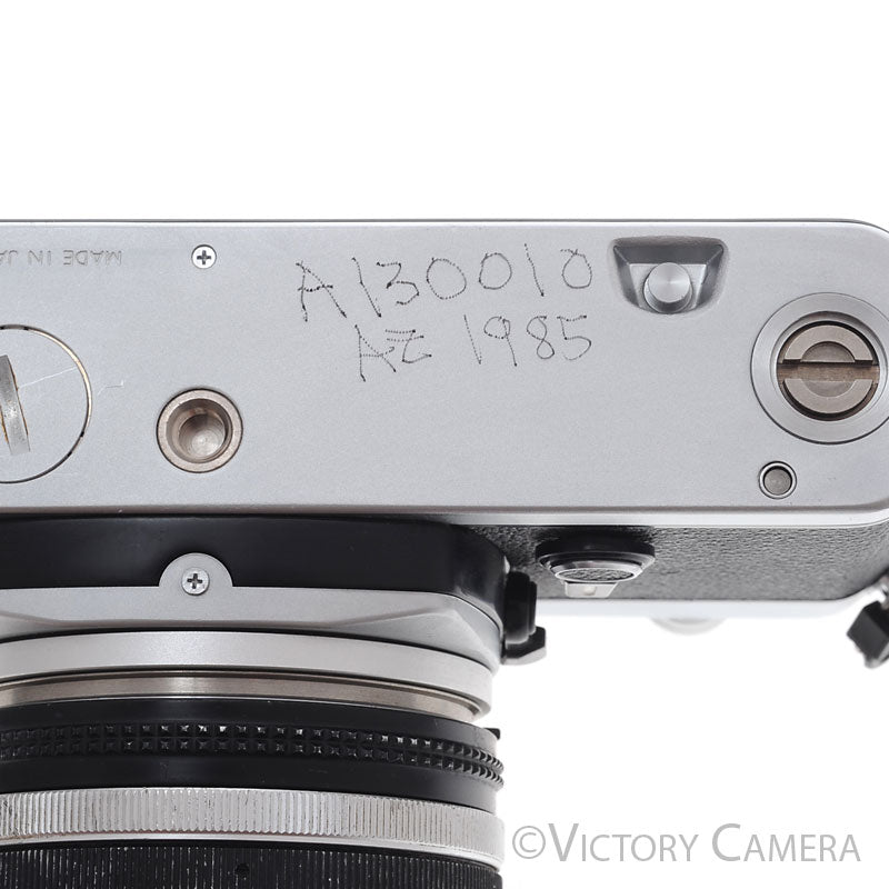 Nikon FM Chrome 35mm Film Camera with 35-105mm AI-S Zoom Lens  [EXC-]