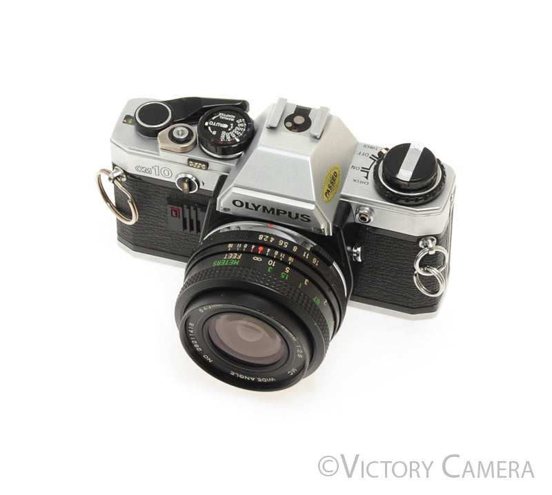 フィルムカメラ Olympus OM-10 Silver 35mm SLR FilmCamera Olympus OM-10 35mm Film Camera with 50/28mm lens – Relics