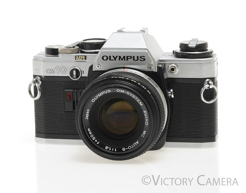 Olympus OM-10 Chrome 35mm Camera w/ 50mm f1.8  Prime Lens -New Seals- [EXC+] - Victory Camera
