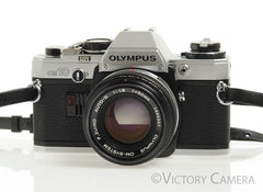 Olympus OM-10 Chrome 35mm Camera w/ 50mm f1.8 Prime Lens -New Seals- [